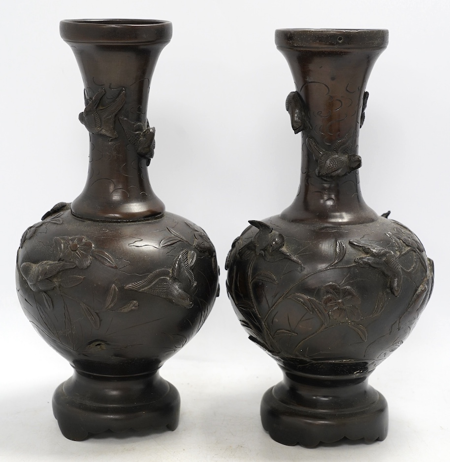 A pair of Chinese bronze vases, 31cm high. Condition - poor